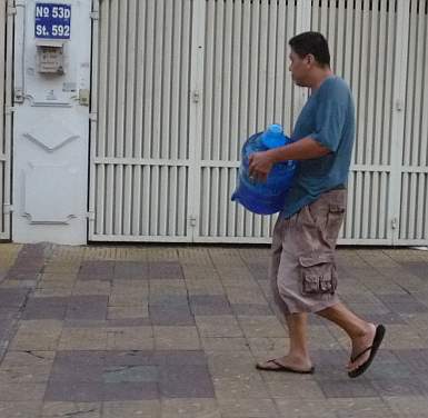 Man carrying water